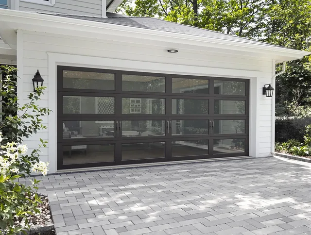 Carver Garage Door Repair design specialist presenting custom garage door options to Carver homeowner